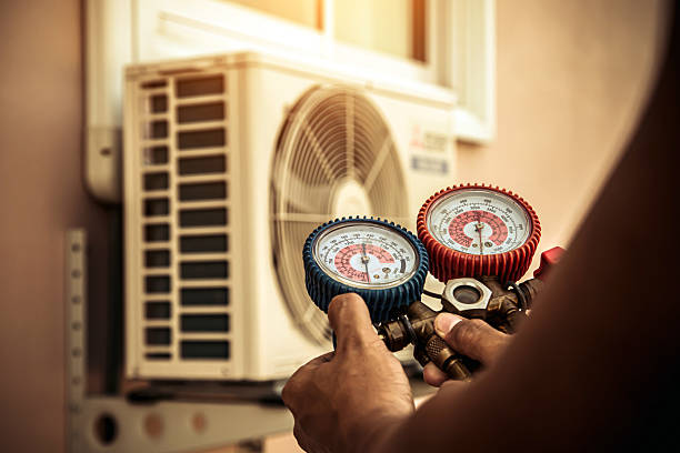 Professional Air Conditioning Service technician working in Laurel, FL